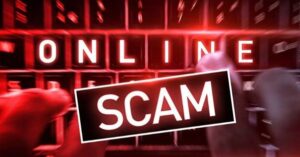 a computer keypad that is written ''Online Scam'' highlighted in bright red colour.