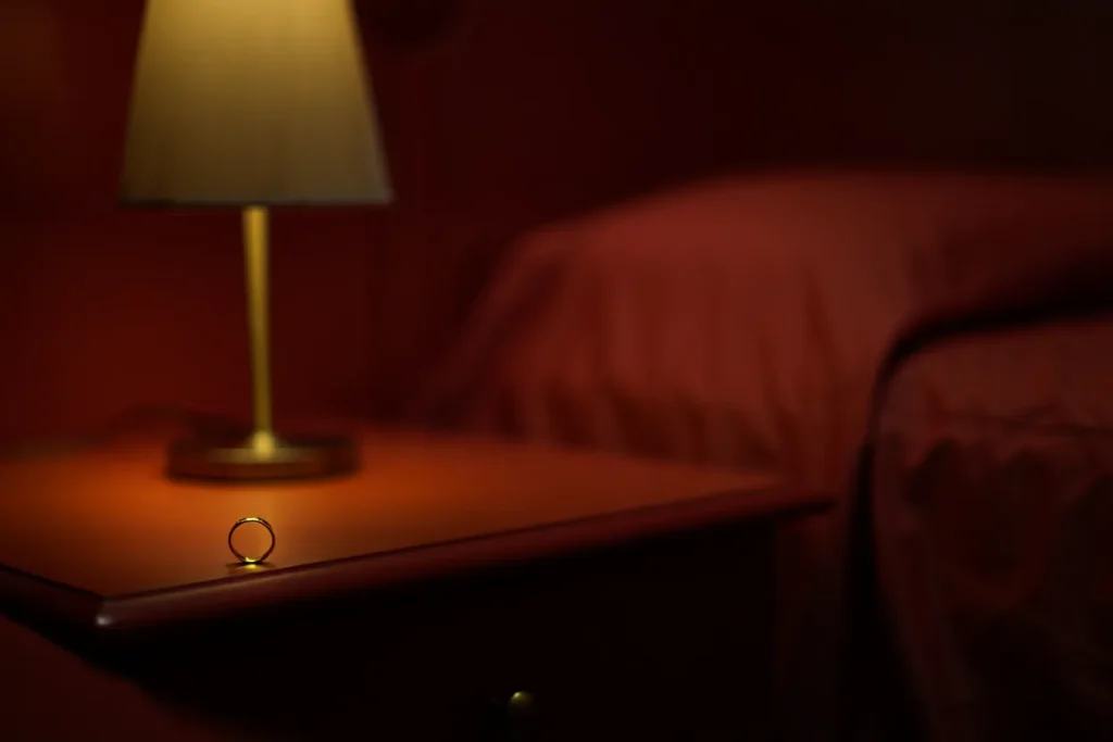 Wedding Ring on Hotel Nightstand